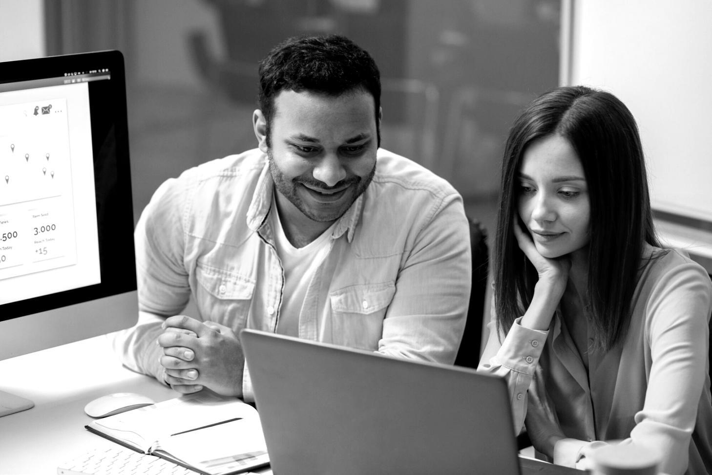Business professionals collaborating during structured testing coordination meeting