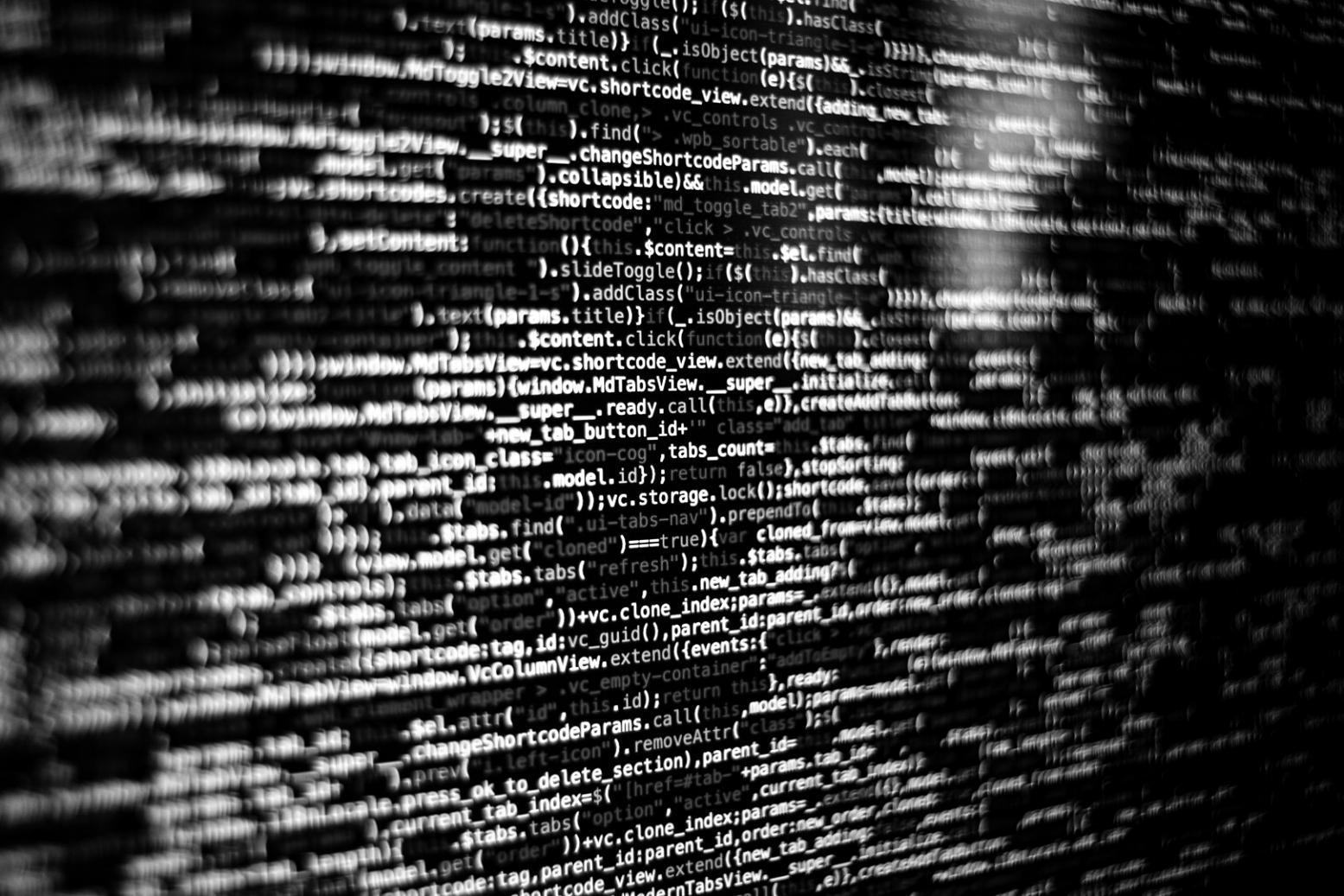 Team reviewing software interface during user acceptance testing session